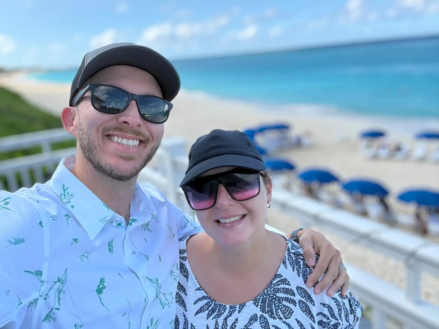 John, owner of Pets In Black, with his wife
